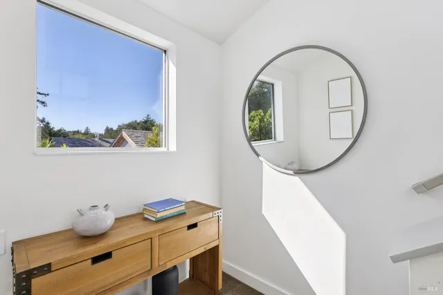 a street sign on a street next to a building