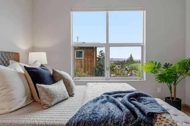 a backyard of a house with wooden floor
