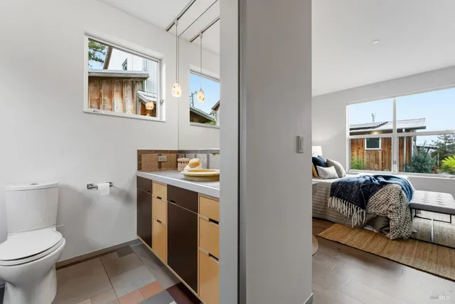 an aerial view of residential houses with outdoor space