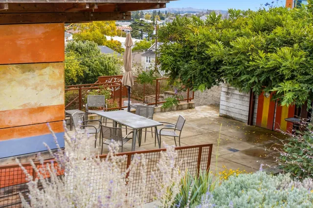 a view of a pathway both side of house