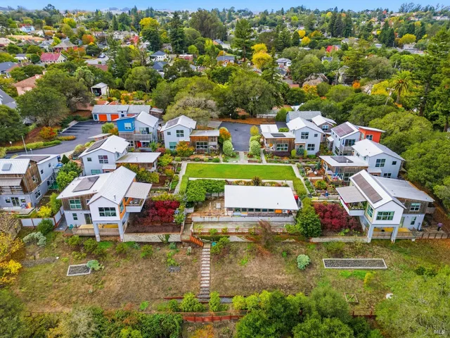 a view of a cafe with sitting area