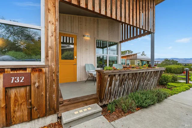 a view of a kitchen area with furniture and window