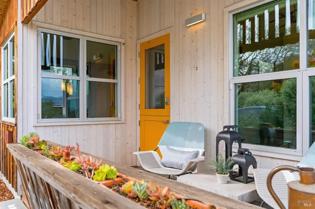 a kitchen with a sink cabinets and window