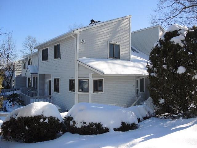 433 Cypress Road, Unit 433 Newington, CT 06111 - Photo 1 of 1 a front view of a house with parking space