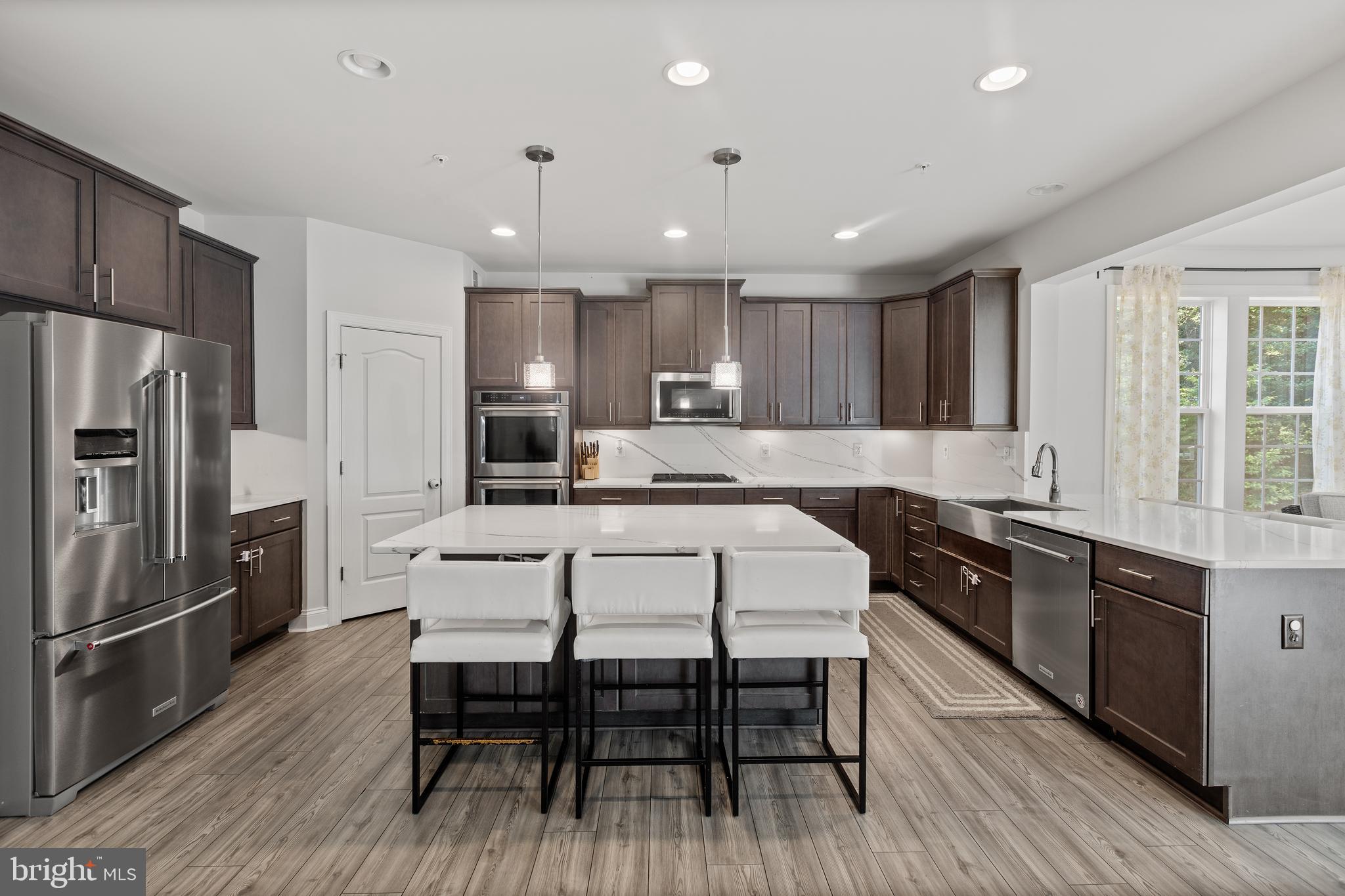 6676 Timber Ridge Lane Bryans Road, MD 20616 - Photo 9 of 49 Kitchen / Breakfast Bar (Main Level)