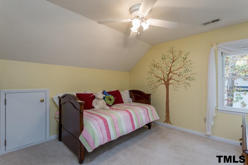 1241 Hillingdon Way Raleigh, NC 27614 - Photo 15 of 21 Light and bright bedroom has a custom tree mural that can easily be updated to suit your needs. Features a great closet and access door to added attic storage (and yes, it's floored!).