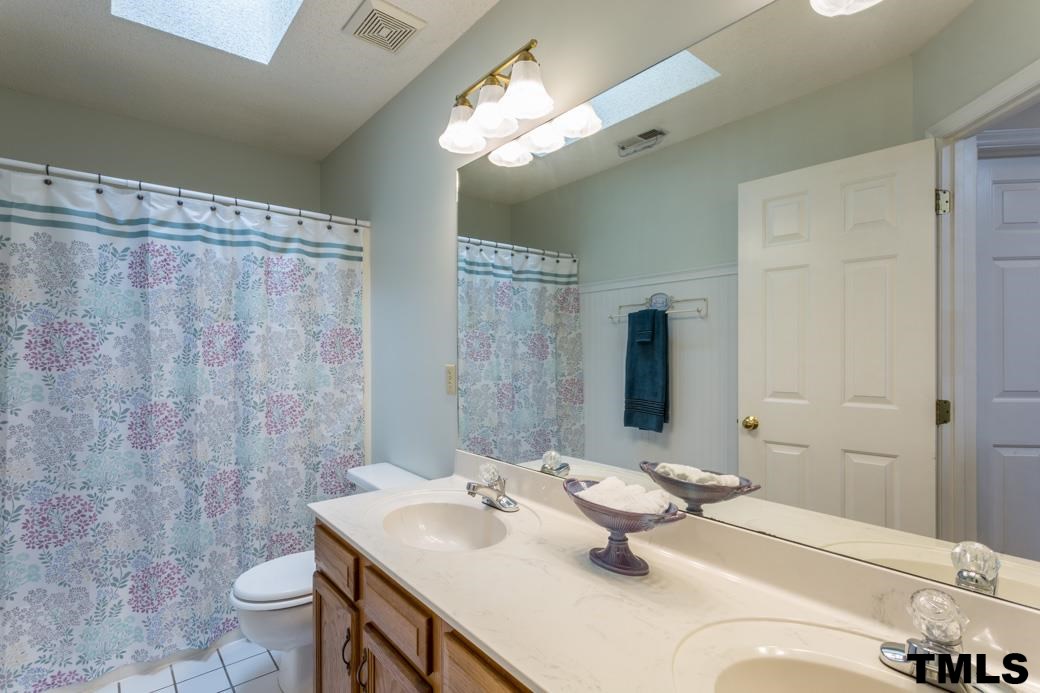 1241 Hillingdon Way Raleigh, NC 27614 - Photo 18 of 21 Spacious Full Bathroom upstairs. Beautiful skylight brings light in so every room has a view!