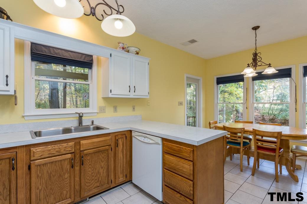1241 Hillingdon Way Raleigh, NC 27614 - Photo 5 of 21 U-Shaped Kitchen allows for cooking and entertaining! Great cabinet space, and if that's not enough, check out the corner pantry!