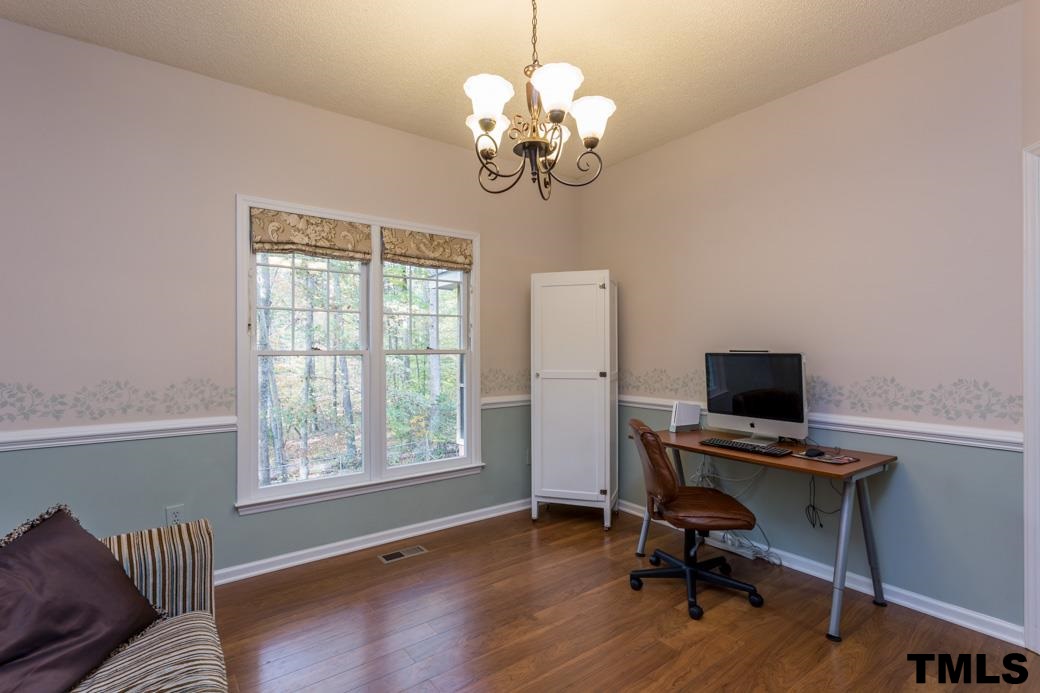 1241 Hillingdon Way Raleigh, NC 27614 - Photo 9 of 21 Currently being used as a flex space, this room is well-suited as Dining Room, located just off of the Kitchen and Family Rooms, this is a central gathering spot of the home. Beautiful molding and view to the back yard!