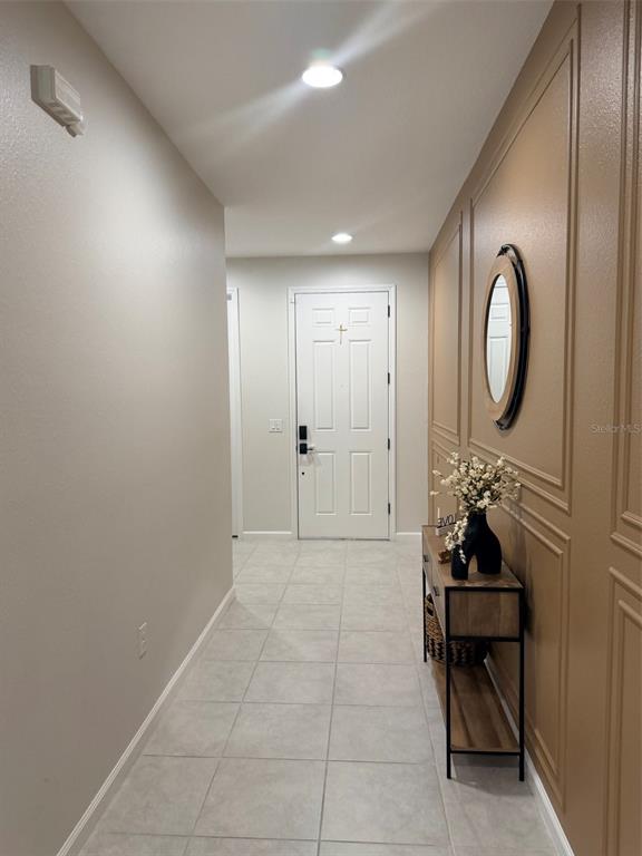 5684 Western Sun Drive St. Cloud, FL 34771 - Photo 2 of 16 a view of a entryway of a house