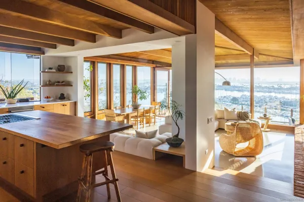 a room with wooden floor and furniture