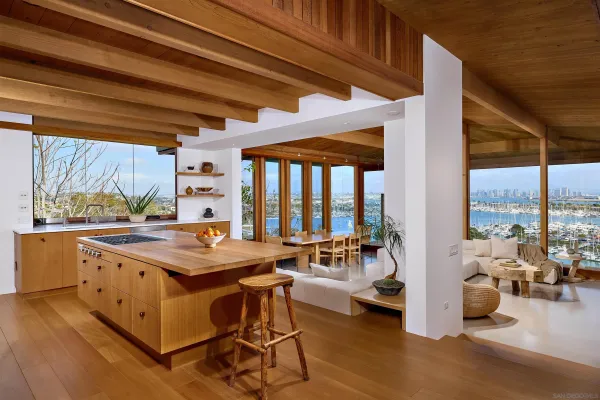 a room with furniture and view of living room