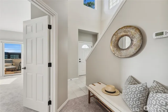 a view of room with furniture and wooden floor