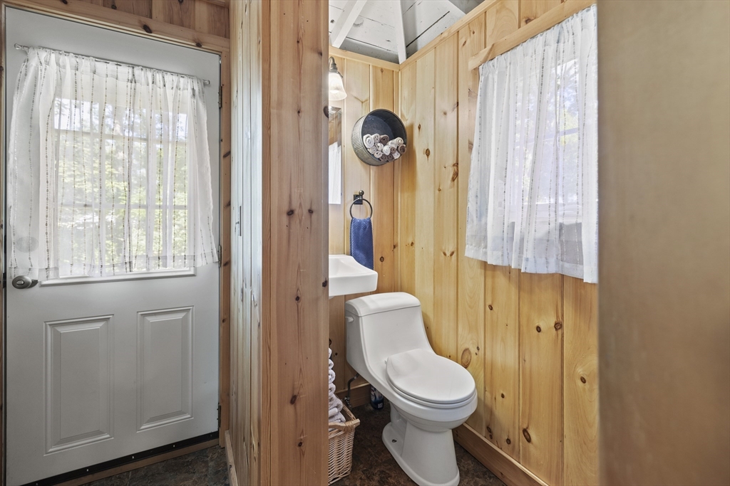 7 Sichols Colony Road Wales, MA 01081 - Photo 11 of 29 a bathroom with a toilet a sink and a window