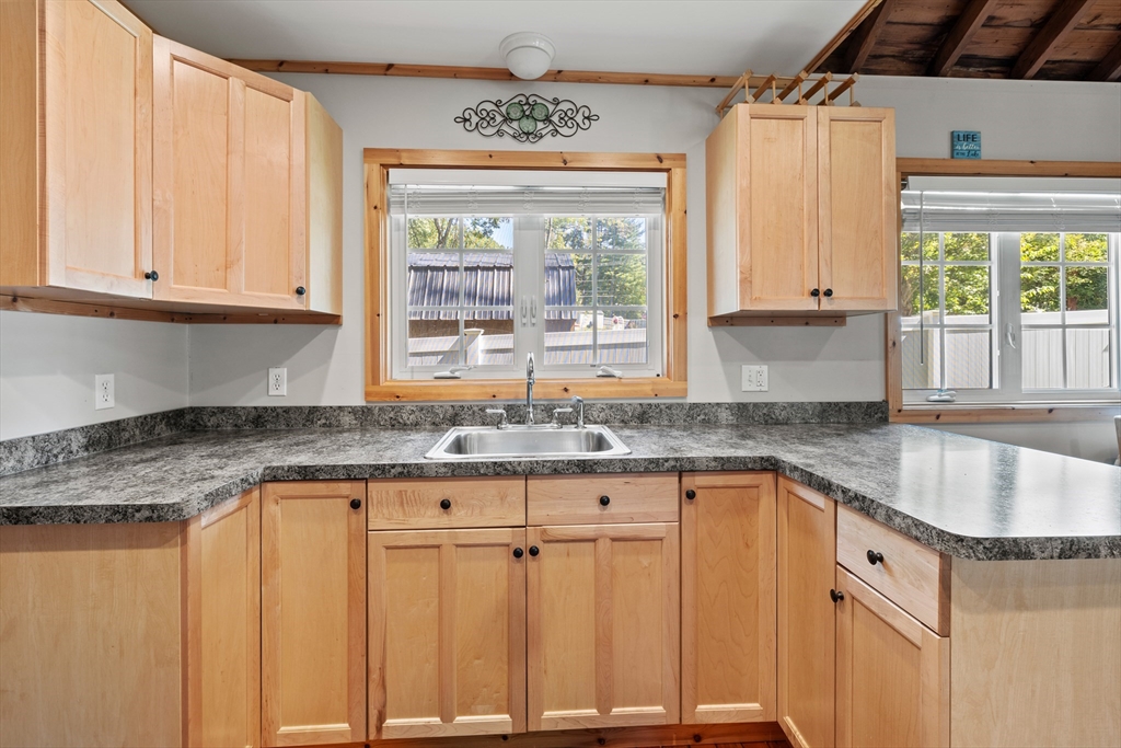 7 Sichols Colony Road Wales, MA 01081 - Photo 3 of 29 a kitchen with granite countertop a sink window and cabinets