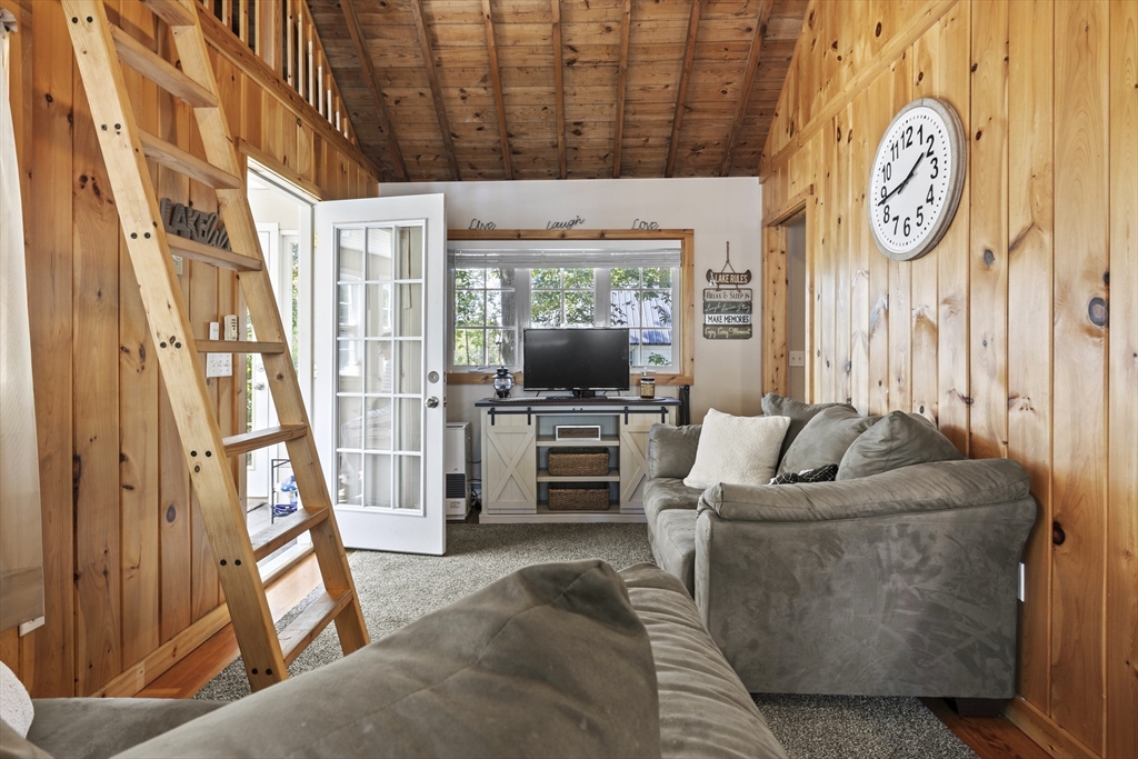 7 Sichols Colony Road Wales, MA 01081 - Photo 5 of 29 a living room with furniture and a flat screen tv