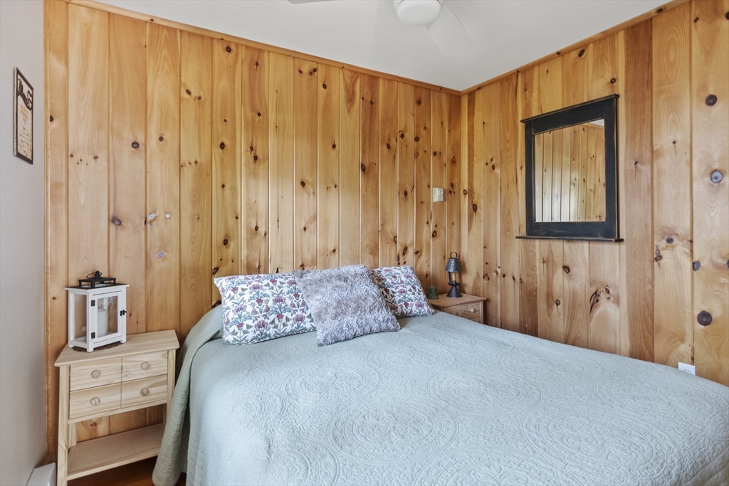 7 Sichols Colony Road Wales, MA 01081 - Photo 7 of 29 a bedroom with a bed and a cabinet