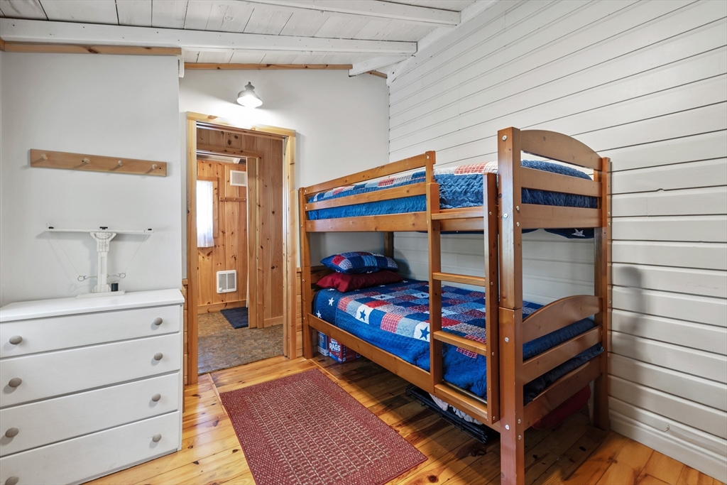 7 Sichols Colony Road Wales, MA 01081 - Photo 10 of 29 a bedroom with a bunk bed and a dresser