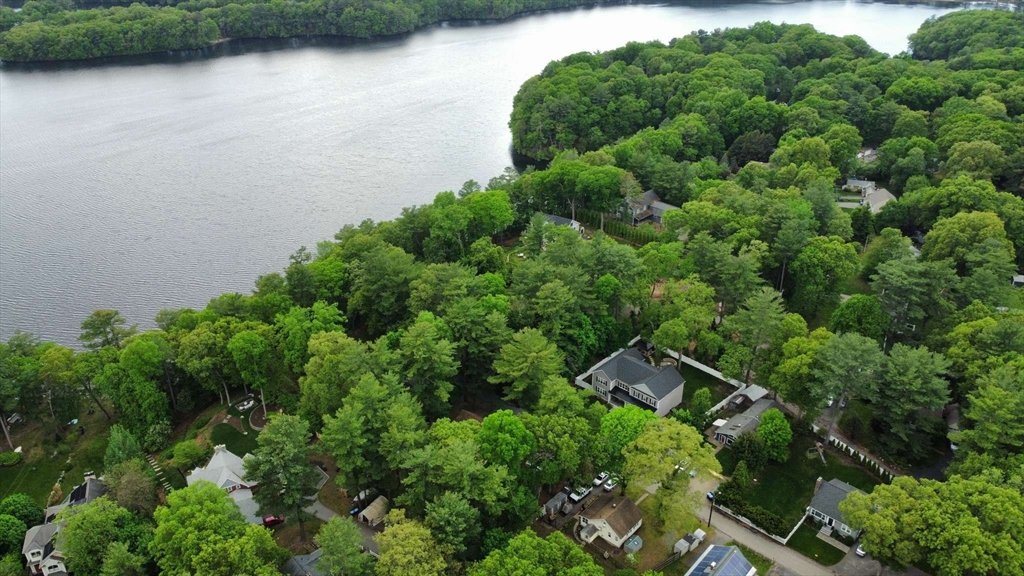 32 Birch Road Natick, MA 01760 - Photo 1 of 38 an aerial view of a house with a yard and lake view
