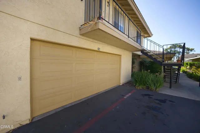 a view of a house with a street