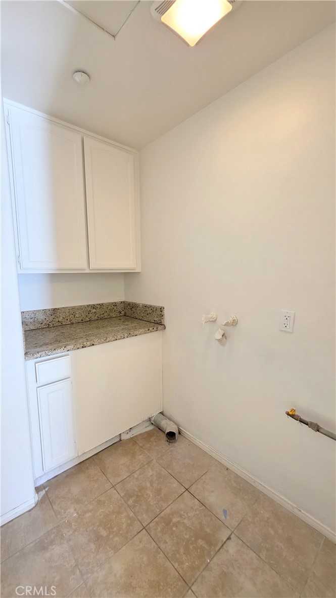 1116 Cloverdale Street Riverside, CA 92501 - Photo 26 of 29 a room with cabinets