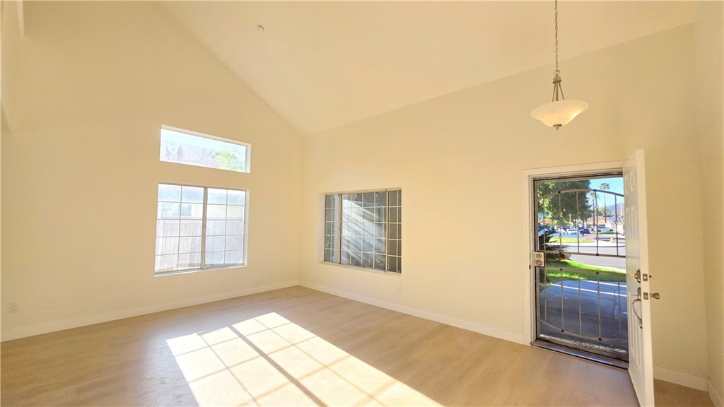 1116 Cloverdale Street Riverside, CA 92501 - Photo 3 of 29 an empty room with windows