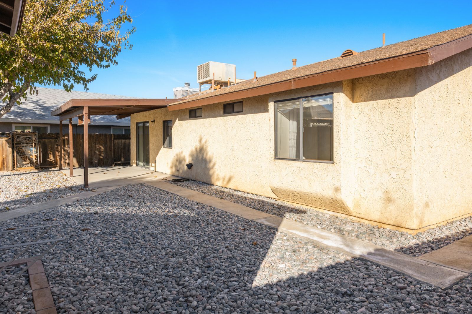 135 Chambers Street Ridgecrest, CA 93555 - Photo 23 of 26 a view of a house with a patio