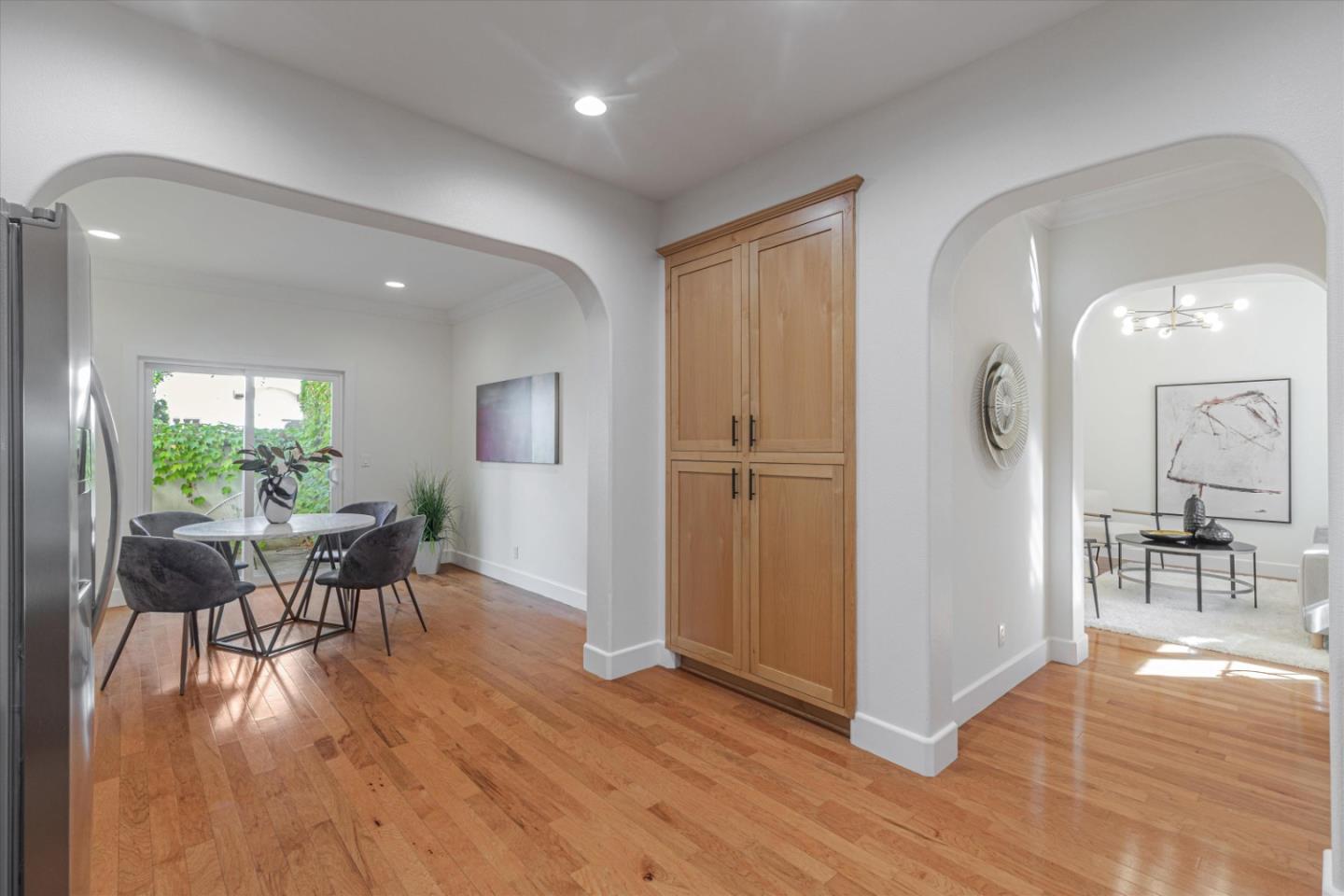 1382 Dahlia Loop San Jose, CA 95126 - Photo 13 of 31 a view of a dining room with furniture and wooden floor