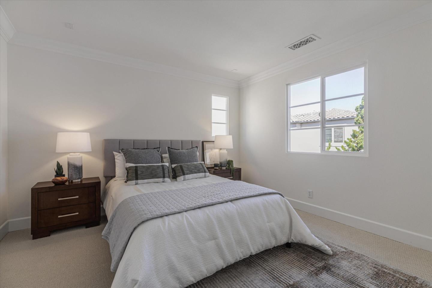 1382 Dahlia Loop San Jose, CA 95126 - Photo 15 of 31 a bedroom with a bed and a window