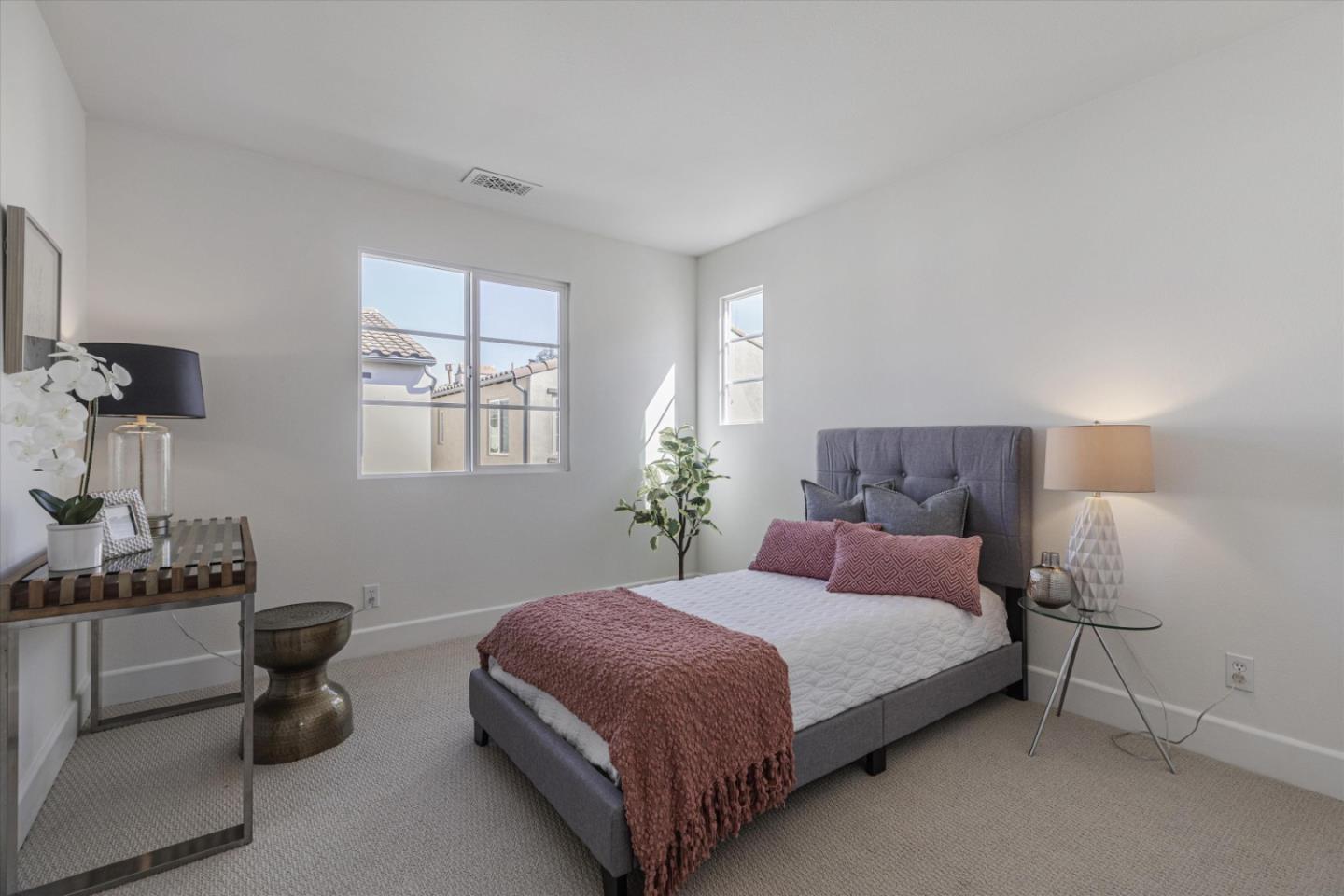 1382 Dahlia Loop San Jose, CA 95126 - Photo 19 of 31 a bedroom with a bed and a couch