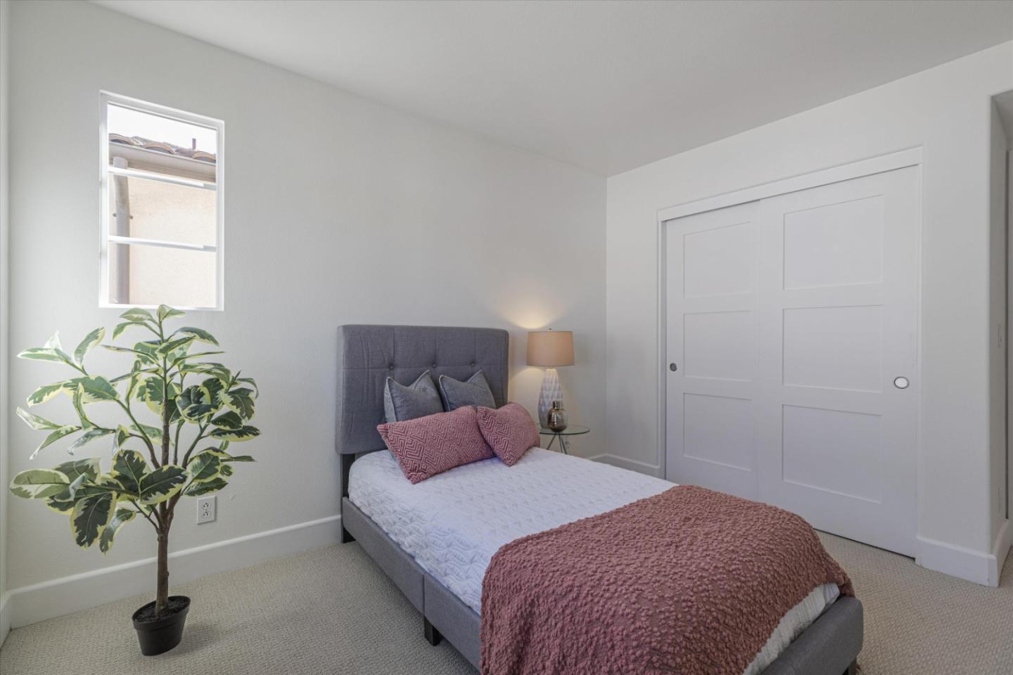 1382 Dahlia Loop San Jose, CA 95126 - Photo 20 of 31 a bedroom with a bed and a potted plant