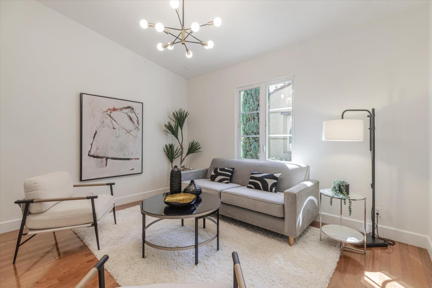 1382 Dahlia Loop San Jose, CA 95126 - Photo 4 of 31 a living room with furniture and a large window