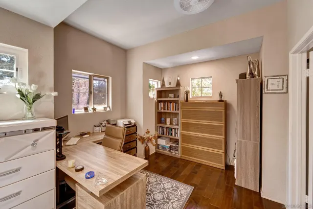 a view of a livingroom with furniture and window