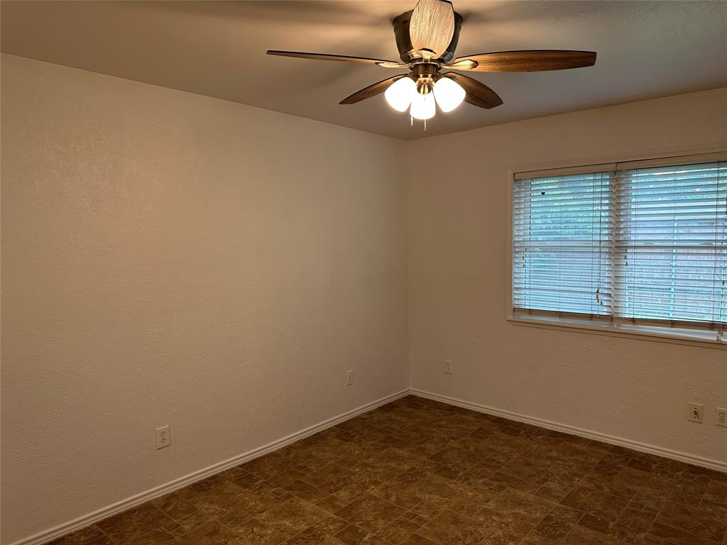 910 Sunny Slope Drive Allen, TX 75002 - Photo 16 of 27 an empty room with a window