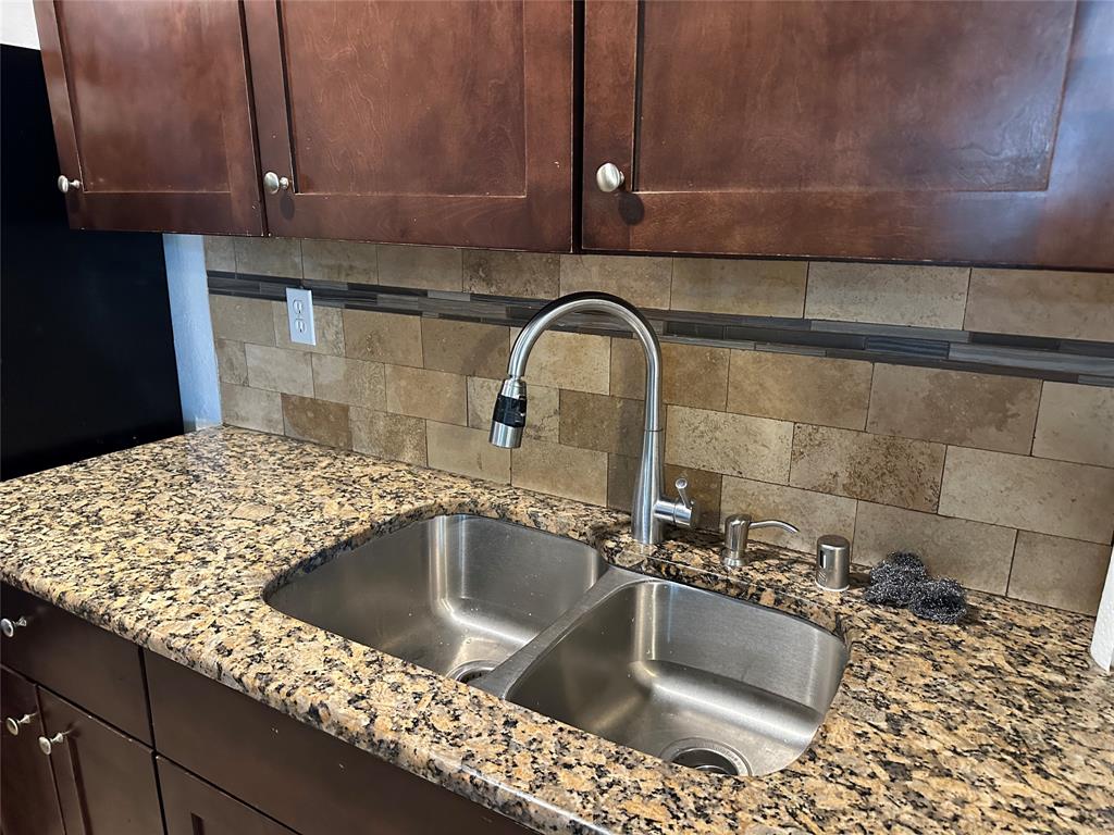 910 Sunny Slope Drive Allen, TX 75002 - Photo 4 of 27 a close view of sink and tap