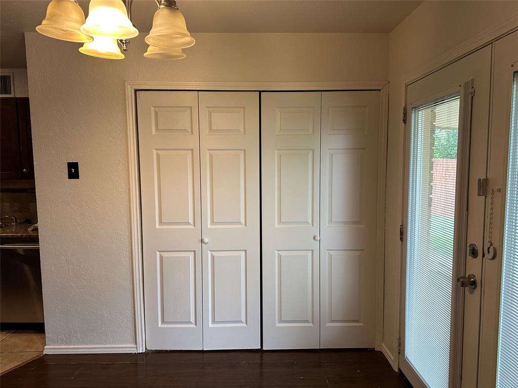 910 Sunny Slope Drive Allen, TX 75002 - Photo 8 of 27 an empty room with wooden floor