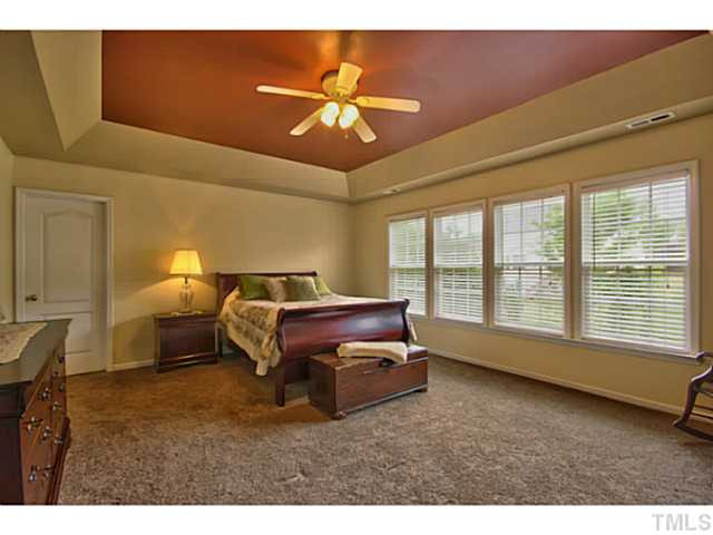 7620 Derek Drive Raleigh, NC 27613 - Photo 12 of 25 Your master bedroom has carpet, trey ceiling and a ceiling fan. Master Bedroom