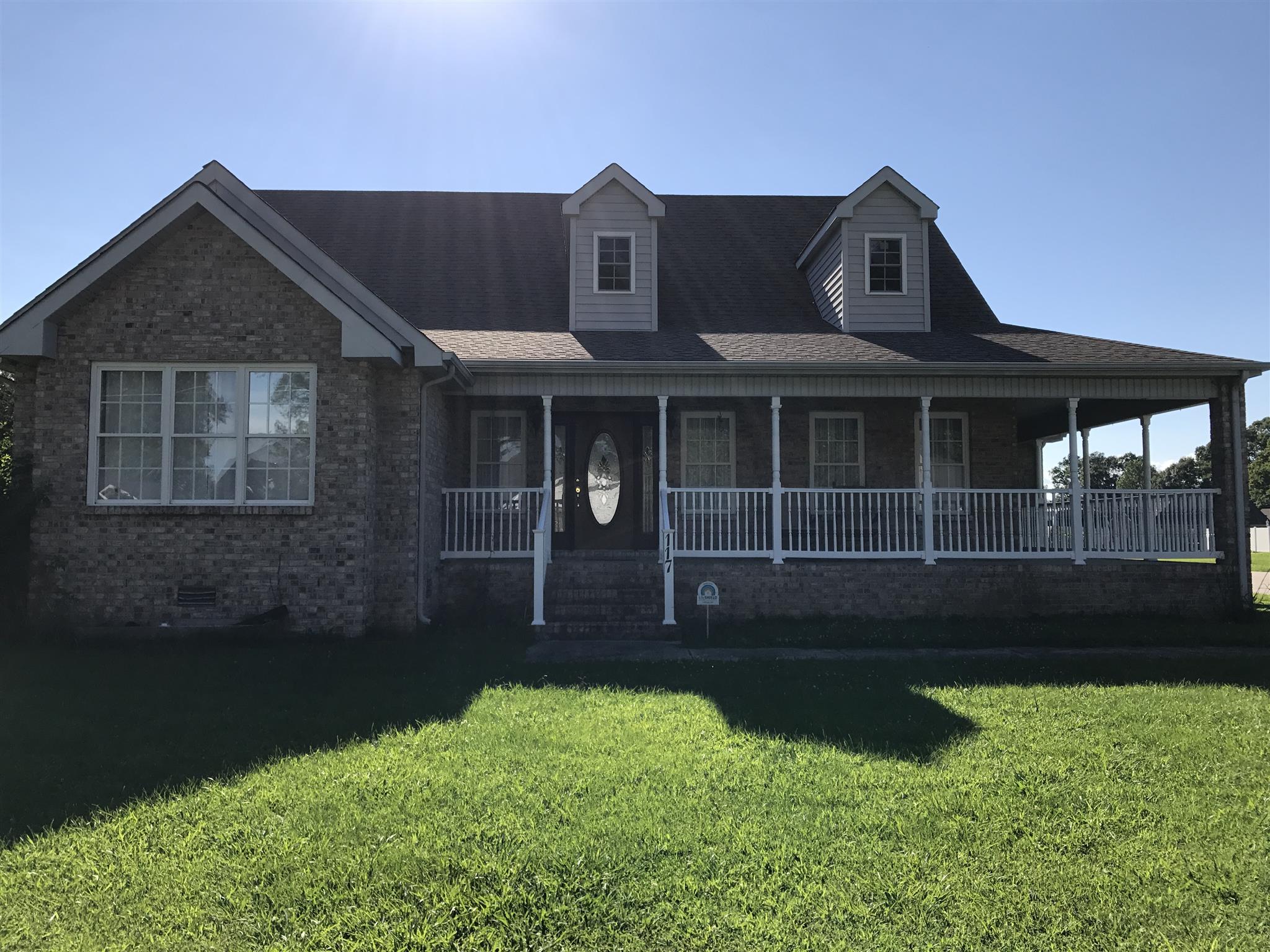 117 Hunt Creek Road Manchester, TN 37355 - Photo 1 of 18 a front view of a house with garden