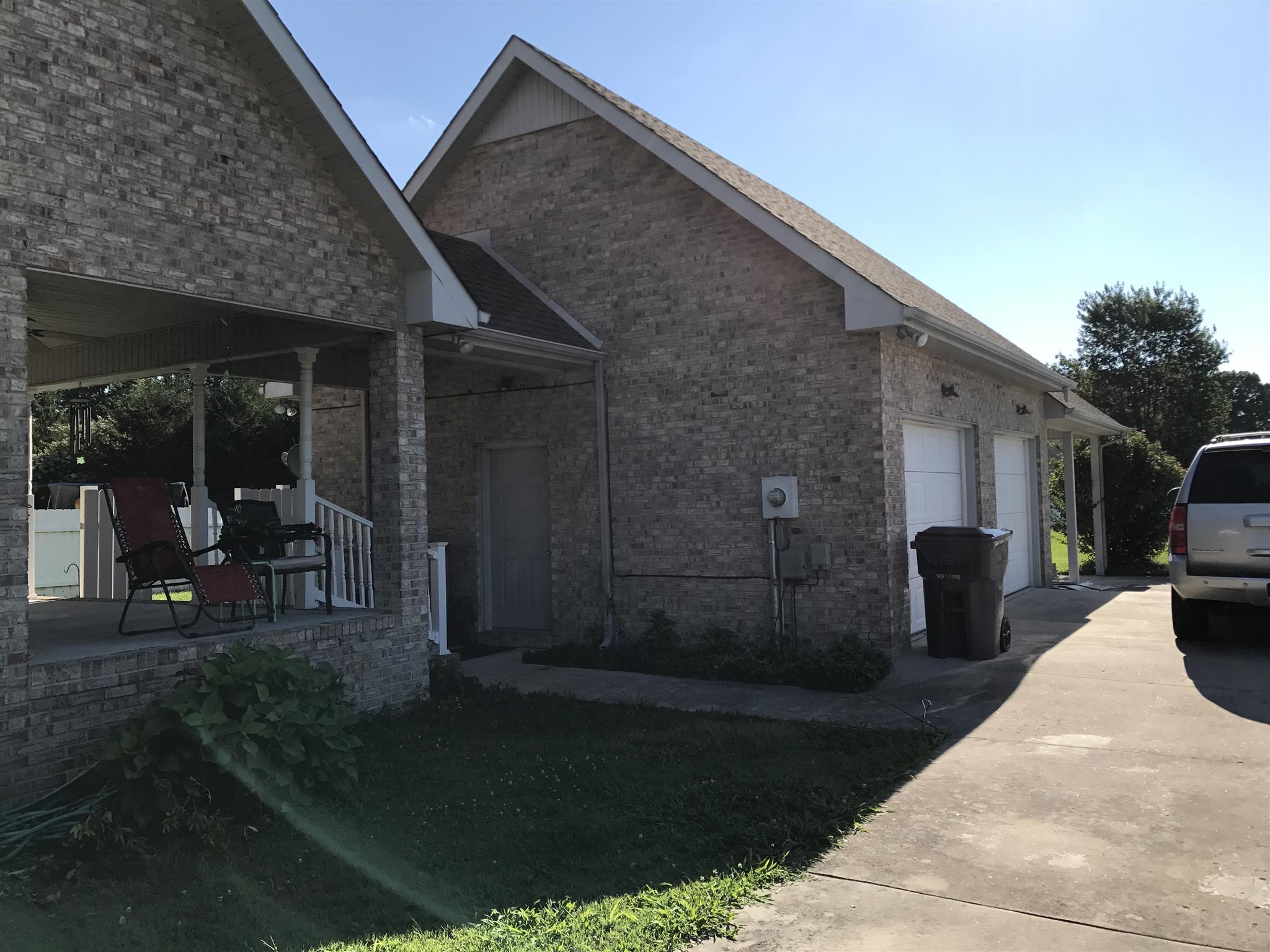 117 Hunt Creek Road Manchester, TN 37355 - Photo 6 of 18 a view of a house with backyard and porch