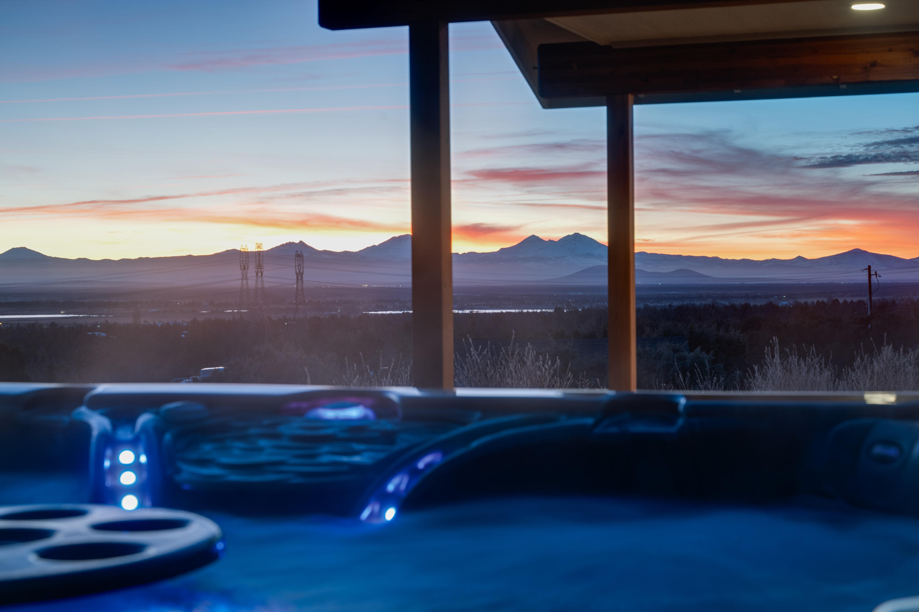 948 Big Sky Road Powell Butte, OR 97753 - Photo 44 of 66 View of the Cascade Range form the hot tub