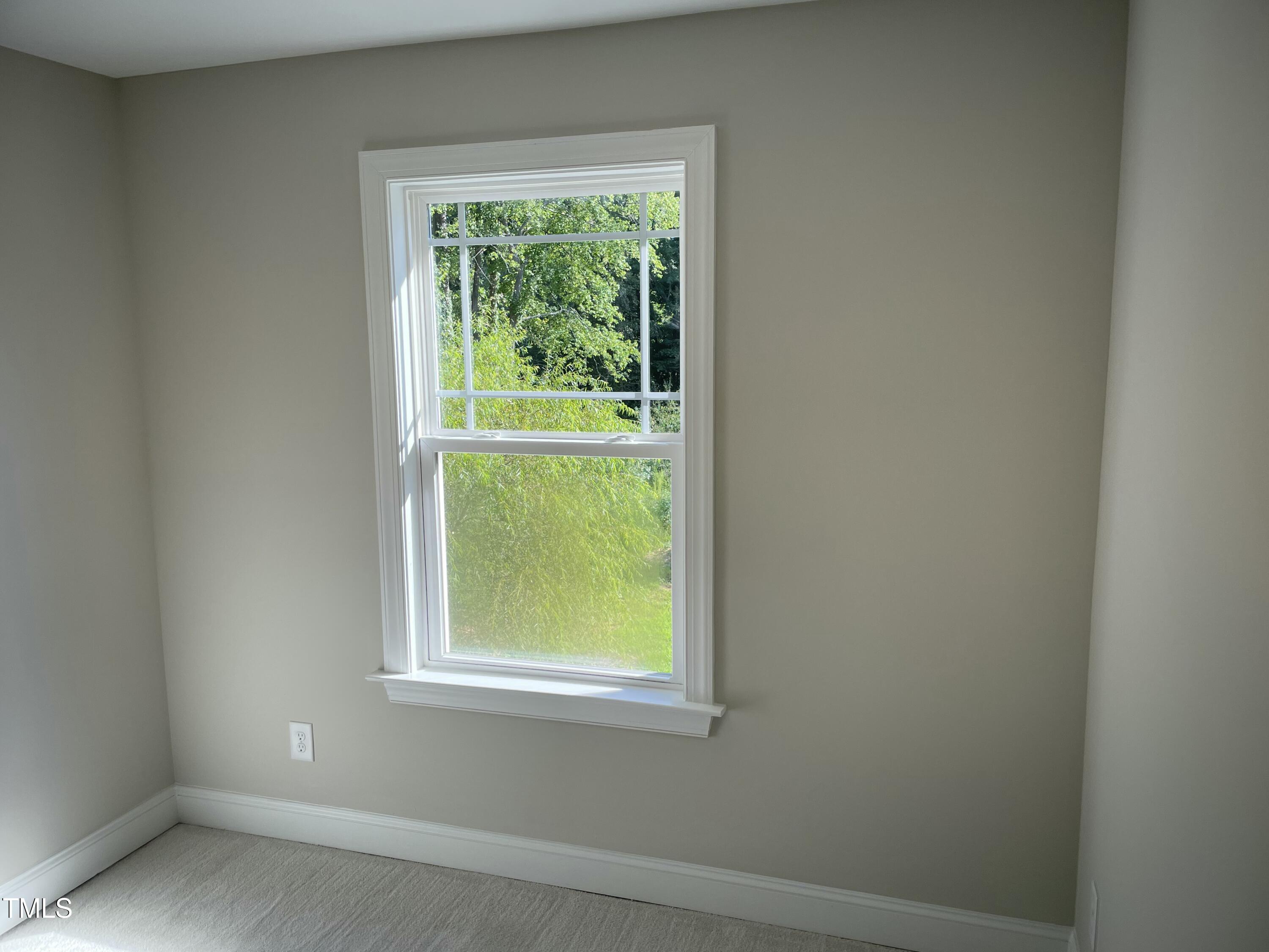 5500 Batoul Lane Raleigh, NC 27606 - Photo 29 of 32 an empty room with a window