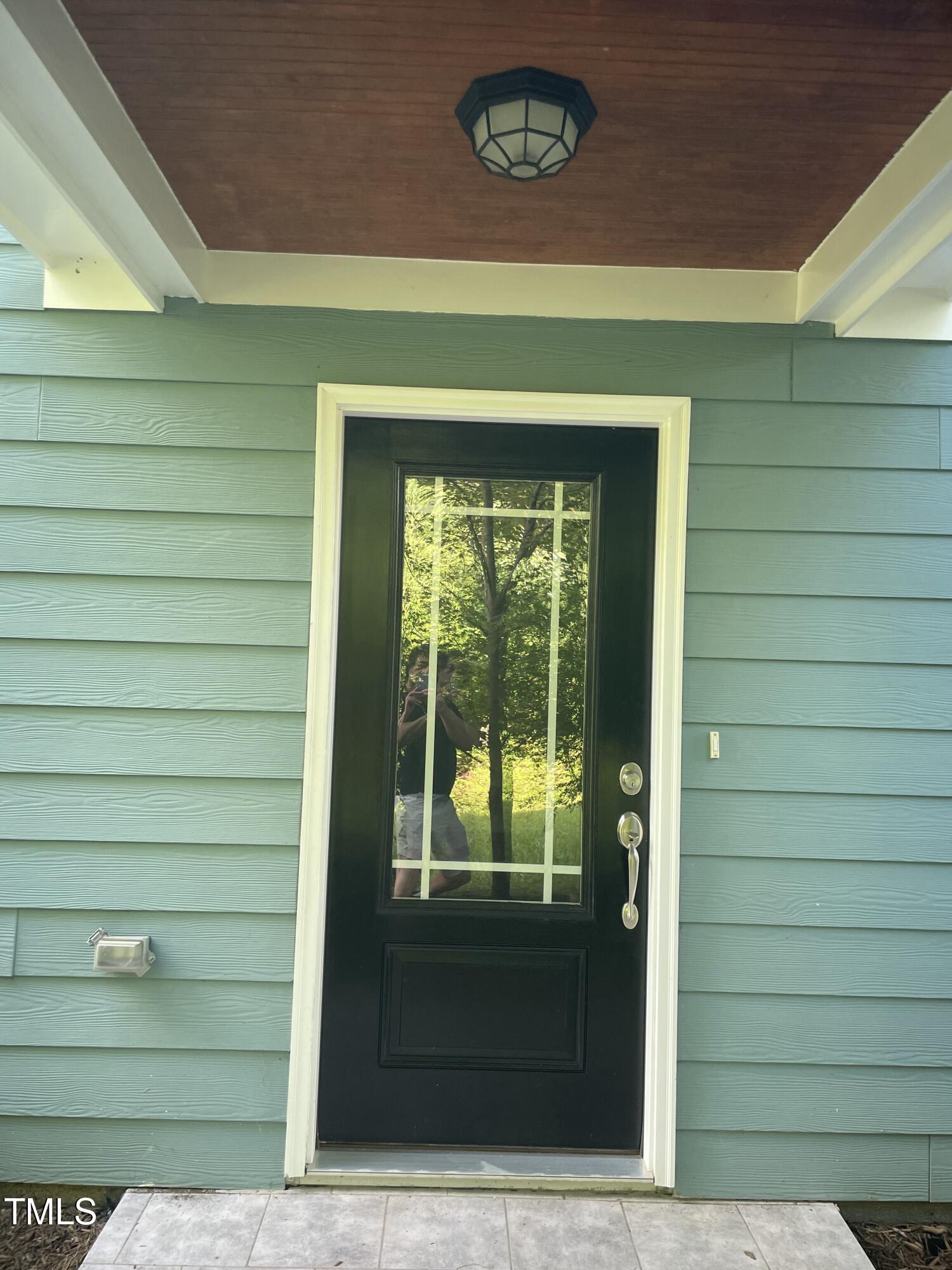 5500 Batoul Lane Raleigh, NC 27606 - Photo 3 of 32 a view of a door front of a house
