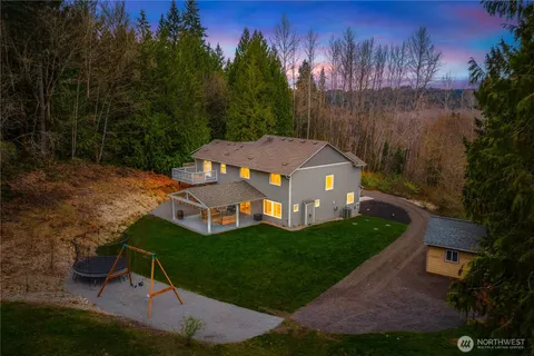an aerial view of a house with garden space sitting space and garden