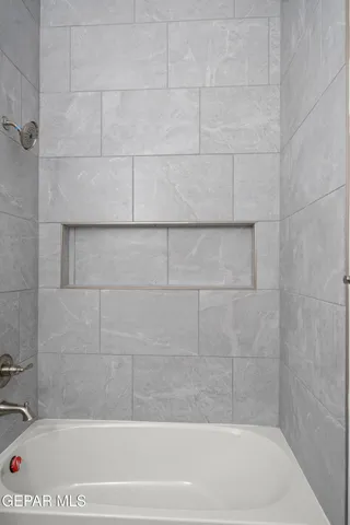 a bathroom with a bathtub