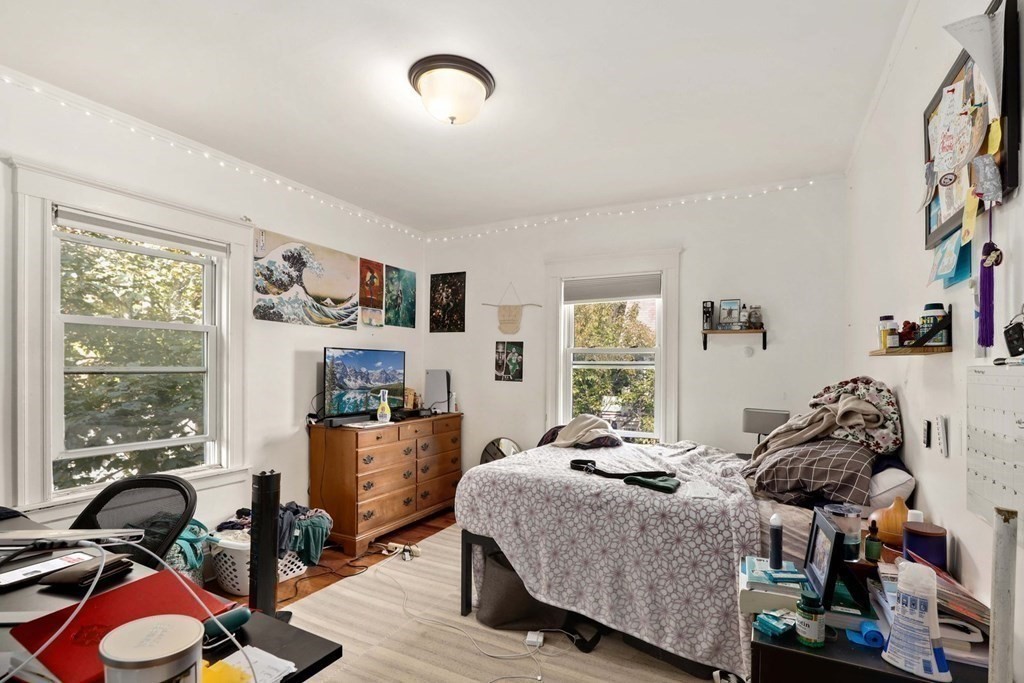 3 Clark Road Brookline, MA 02445 - Photo 14 of 24 a bedroom with furniture and a large window