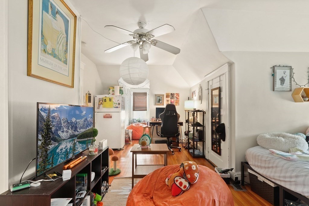 3 Clark Road Brookline, MA 02445 - Photo 16 of 24 a living room with furniture and wooden floor