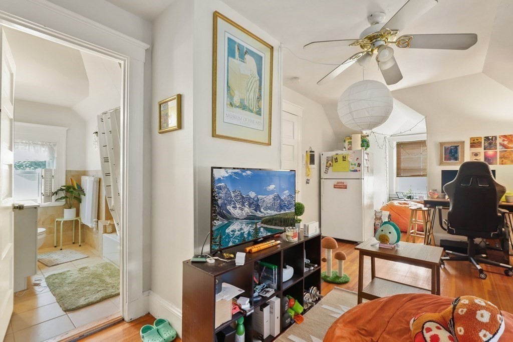 3 Clark Road Brookline, MA 02445 - Photo 17 of 24 a view of a livingroom with workspace and a window