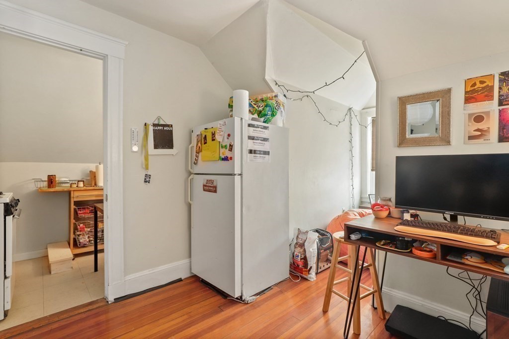 3 Clark Road Brookline, MA 02445 - Photo 20 of 24 a room with furniture and wooden floor