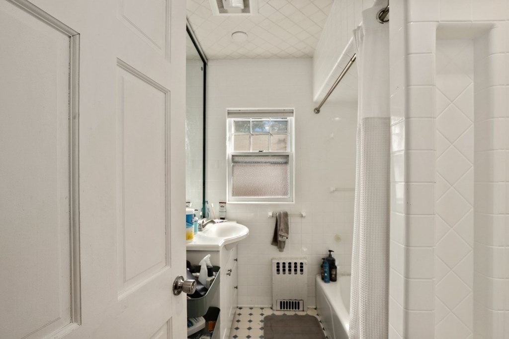 3 Clark Road Brookline, MA 02445 - Photo 21 of 24 a bathroom with a sink and toilet