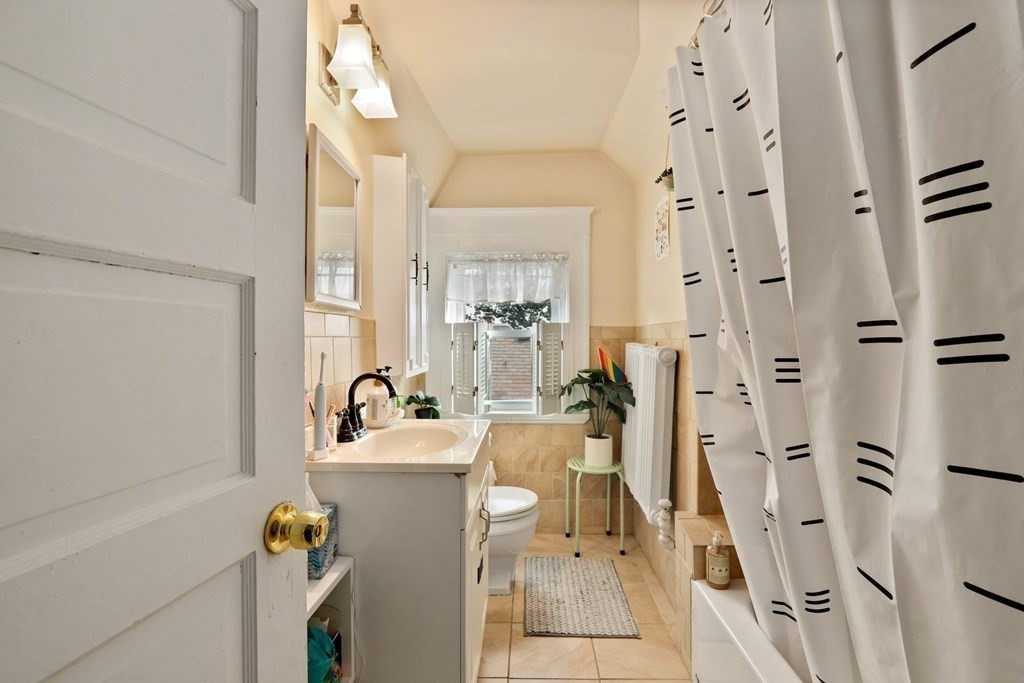 3 Clark Road Brookline, MA 02445 - Photo 22 of 24 a bathroom with a sink mirror toilet and shower
